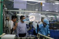 小榄镇薛镇长一行莅临樱花智能锁参观指导