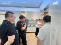 中燃协与广东燃协到访火王 点赞智能灶技术成果